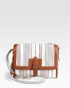 Bright vertical stripes adorn this soft nautical-inspired design, trimmed in ultra-rich contrasting leather. Adjustable shoulder strap, 17-20½ dropLeather flap top closureOne outside open pocketOne inside zip pocketTwo inside open pocketsLogo-printed canvas lining10¼W X 8½H X 3DImported