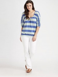 This soft knit, with dolman sleeves, is accented with gathers at the neckline and banded hem.Scoop necklineElbow-length dolman sleevesBanded hemAbout 28 from shoulder to hem50% Supima cotton/50% micro modalMachine washMade in USA This soft knit, with dolman sleeves, is accented with gathers at the neckline and banded hem.Scoop necklineElbow-length dolman sleevesBanded hemAbout 28 from shoulder to hem50% Supima cotton/50% micro modalMachine washMade in USA