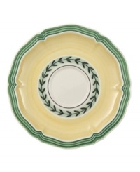 In sunny yellow porcelain with a scalloped edge and pretty vine detail, this French Garden after-dinner saucer is perfectly at home on casual country tables. In sunny yellow porcelain with a scalloped edge and pretty vine detail, this French Garden after-dinner saucer is perfectly at home on casual country tables.