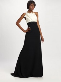 Soft, sculptural pleats add an intriguing element to this floor-length, bi-color design.Asymmetrical necklinePleated bodice detailBeaded empire waistFlared skirt with trainConcealed side zipFully linedAbout 50 from natural waistBodice: silkSkirt: polyesterDry cleanImportedModel shown is 5'10 (177cm) wearing US size 4. Soft, sculptural pleats add an intriguing element to this floor-length, bi-color design.Asymmetrical necklinePleated bodice detailBeaded empire waistFlared skirt with trainConcealed side zipFully linedAbout 50 from natural waistBodice: silkSkirt: polyesterDry cleanImportedModel shown is 5'10 (177cm) wearing US size 4.
