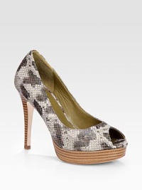 Multicolored snake-print enlivens this classic leather silhouette. Stacked heel, 4 (100mm)Stacked platform, 1 (25mm)Compares to a 3 heel (75mm)Peep toeSnake-print leather upperLeather lining and solePadded insoleImportedOUR FIT MODEL RECOMMENDS ordering one half size up as this style runs small. Multicolored snake-print enlivens this classic leather silhouette. Stacked heel, 4 (100mm)Stacked platform, 1 (25mm)Compares to a 3 heel (75mm)Peep toeSnake-print leather upperLeather lining and solePadded insoleImportedOUR FIT MODEL RECOMMENDS ordering one half size up as this style runs small.
