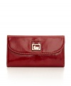 Patent leather adds glossy shine to Dooney & Bourke's sophisticated continental wallet.