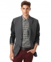 Uptown polish meets downtown rock with this faux-leather moto-inspired sport coat from Bar III.