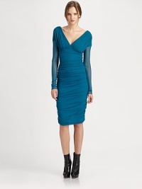 A mesh dress offering a body-hugging fit. This style is also complemented flawlessly by flattering ruched and gathered details.V-necklineLong sleevesEmpire waistRuched silhouetteFully linedAbout 29 from natural waistPolyamideDry cleanMade in Italy Model shown is 5'11 (180cm) wearing US size Small. A mesh dress offering a body-hugging fit. This style is also complemented flawlessly by flattering ruched and gathered details.V-necklineLong sleevesEmpire waistRuched silhouetteFully linedAbout 29 from natural waistPolyamideDry cleanMade in Italy Model shown is 5'11 (180cm) wearing US size Small.