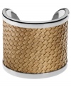 Weave together your perfect ensemble. This Michael Kors cuff bracelet features natural braided leather sitting atop silver tone brass. Approximate diameter: 2-1/4 inches.