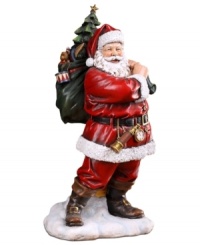 Rose-cheeked and with a joyful smile upon his face, Santa creates a festive holiday mood with his bag of toys slung over his shoulder in preparation for a long night of delivering gifts. Rose-cheeked and with a joyful smile upon his face, Santa creates a festive holiday mood with his bag of toys slung over his shoulder in preparation for a long night of delivering gifts.