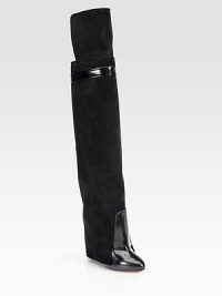 A covered stacked wedge elevates this head-turning design made of buttery suede and leather. Hidden stacked wedge, 5 (125mm)Shaft, 9½Leg circumference, 10½Suede and leather upperSide zipLeather lining and solePadded insoleMade in Italy A covered stacked wedge elevates this head-turning design made of buttery suede and leather. Hidden stacked wedge, 5 (125mm)Shaft, 9½Leg circumference, 10½Suede and leather upperSide zipLeather lining and solePadded insoleMade in Italy