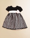With a flower detail at the waist, gorgeous velvet and a polka-dot skirt, this pint-sized party dress is a must-have for the season.CrewneckBack button closureShort sleevesSash with flower detailTulle skirtPolyesterFully linedDry cleanMade in the USA of imported fabrics