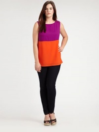 One of the hottest trends of the season, colorblocking makes this sleeveless top truly stand out from the crowd. Round neckSleevelessSide slitsButton closure at keyhole backPull-on style About 29 from shoulder to hemViscoseDry cleanImported One of the hottest trends of the season, colorblocking makes this sleeveless top truly stand out from the crowd. Round neckSleevelessSide slitsButton closure at keyhole backPull-on style About 29 from shoulder to hemViscoseDry cleanImported