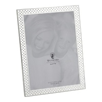 The delicate cross-beaded design that has made Waterford's Padova Fine Flatware and Dinnerware a perennial favorite now adorns this gorgeous 5x7 silverplated picture frame that bears its special name. The frame is lacquered to resist tarnish. Comes elegantly gift boxed with a special Waterford gray flannel pouch. The delicate cross-beaded design that has made Waterford's Padova Fine Flatware and Dinnerware a perennial favorite now adorns this gorgeous 5x7 silverplated picture frame that bears its special name. The frame is lacquered to resist tarnish. Comes elegantly gift boxed with a special Waterford gray flannel pouch.