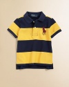 A colorful striped design accents this classic polo shirt in lightweight, knit cotton.Pointed polo collarShort sleevesButton-frontUneven vented hemCottonMachine washImported Please note: Number of buttons may vary depending on size ordered. 