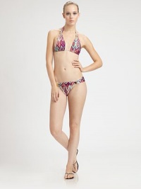 Triangle cups, sleek fabrication and gold hardware give this design a sexy-chic look.Halter strap ties at neckBack tie closure84% polyamide/16% elastaneFully linedHand washImported Please note: Bikini bottom sold separately. Triangle cups, sleek fabrication and gold hardware give this design a sexy-chic look.Halter strap ties at neckBack tie closure84% polyamide/16% elastaneFully linedHand washImported Please note: Bikini bottom sold separately.