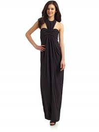 THE LOOKT-strap halter neckline with hook closureSleevelessPleated and ruched detailsEmpire waistBack cutout detailTHE FITAbout 57 from shoulder to hemTHE MATERIAL86% rayon/14% spandexFully linedCARE & ORIGINDry cleanMade in USAModel shown is 5'9½ (176cm) wearing US size 4. THE LOOKT-strap halter neckline with hook closureSleevelessPleated and ruched detailsEmpire waistBack cutout detailTHE FITAbout 57 from shoulder to hemTHE MATERIAL86% rayon/14% spandexFully linedCARE & ORIGINDry cleanMade in USAModel shown is 5'9½ (176cm) wearing US size 4.