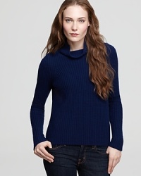 A solid rib knit blended from wool and yak in a shrunken turtleneck style. A solid rib knit blended from wool and yak in a shrunken turtleneck style.