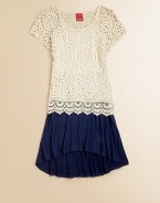 The perfect length to pair with your favorite boots, this lightweight skirt features an elastic waistband and trendy hi-lo hem.Elastic waistbandHi-lo hem95% rayon/5% elastaneMachine washImported