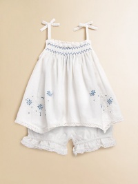 Sweet floral embroidery adorns a babydoll tunic, complete with a matching ruffle-trimmed bloomer for the perfect warm-weather set.Straight necklineSpaghetti straps with bowsPullover styleSmocked bodiceHandkerchief hemElastic waistbandCottonMachine washImported