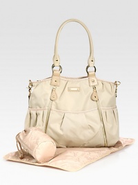 Sturdy and stunning for life on the go with your baby, in enduring nylon with faux leather trim and lots of thoughtful details.Double top handles, 10 dropRemovable, adjustable webbed shoulder strap, 16-25 dropTop zip closePleated, outside open pocketsOutside zipper detailInside open pocketsIncludes changing pad and insulated bottle caseInside clip-on case for phone, keys, credit card or lipstickFully linedNylon17W X 12H X 5DImported Sturdy and stunning for life on the go with your baby, in enduring nylon with faux leather trim and lots of thoughtful details.Double top handles, 10 dropRemovable, adjustable webbed shoulder strap, 16-25 dropTop zip closePleated, outside open pocketsOutside zipper detailInside open pocketsIncludes changing pad and insulated bottle caseInside clip-on case for phone, keys, credit card or lipstickFully linedNylon17W X 12H X 5DImported