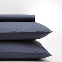 Fitted sheet with little dashes of viola on a twilight colored ground. Vat-dyed and printed, 220-thread count combed cotton percale. Fitted sheet with little dashes of viola on a twilight colored ground. Vat-dyed and printed, 220-thread count combed cotton percale.