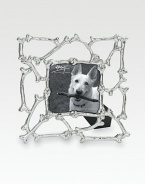 A whimsical frame inspired by the most important members of the family (and the treats they love), crafted with a lattice of dog bones in nickelplated stainless steel. Fits a 3 X 3 photographOverall, 6½ X 6½ totalImported