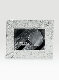 Delicately veined impressions of fallen leaves add a sylvan glow to favorite photos. Fits a 5 X 7 photoSilverplated and tarnish resistantHandmade in India Delicately veined impressions of fallen leaves add a sylvan glow to favorite photos. Fits a 5 X 7 photoSilverplated and tarnish resistantHandmade in India