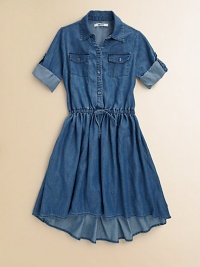 A classic silhouette shaped with a pretty gathered waist, flared skirt and on-trend hi/lo hem.Point collarShort roll-tab sleevesFront button placketFront flap pockets with buttonsElasticized drawstring waistA-line skirtHi/lo hem77% cotton/23% polyesterMachine washImported A classic silhouette shaped with a pretty gathered waist, flared skirt and on-trend hi/lo hem.Point collarShort roll-tab sleevesFront button placketFront flap pockets with buttonsElasticized drawstring waistA-line skirtHi/lo hem77% cotton/23% polyesterMachine washImported
