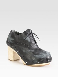 Raw edges and a wooden textured heel transform this vintage-inflected staple of distressed leather. Wooden leaf-embossed heel, 3½ (90mm)Wooden and leather-covered platform, 1¼ (30mm)Compares to a 2¼ heel (60mm)Distressed leather upperLeather liningRubber solePadded insoleImported Raw edges and a wooden textured heel transform this vintage-inflected staple of distressed leather. Wooden leaf-embossed heel, 3½ (90mm)Wooden and leather-covered platform, 1¼ (30mm)Compares to a 2¼ heel (60mm)Distressed leather upperLeather liningRubber solePadded insoleImported