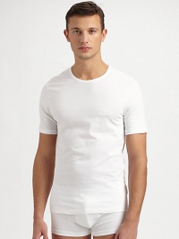 A foundation of every man's style, shaped in the world's finest Egyptian cotton. Pack of 3 in white Crewneck Cotton Machine wash Imported A foundation of every man's style, shaped in the world's finest Egyptian cotton. Pack of 3 in white Crewneck Cotton Machine wash Imported