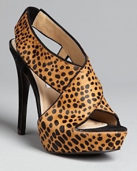 DIANE von FURSTENBERG's popular Zia design goes wild in a fashionable exotic print on luxe calf hair: Spot on. DIANE von FURSTENBERG's popular Zia design goes wild in a fashionable exotic print on luxe calf hair: Spot on.