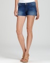 Put glamorous gams on blast with a pair of J Brand cut off shorts that feature a low rise and frayed hem.