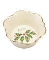 Made with love. This tiny porcelain dish from Lenox's collection of serveware and serving dishes is trimmed with gold and a holly motif to match the beloved Holiday dinnerware collection.