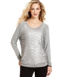 A classic knit sweatshirt gets embellished with sparkling sequins in this fashion-forward look from Cha Cha Vente. A classic knit sweatshirt gets embellished with sparkling sequins in this fashion-forward look from Cha Cha Vente.