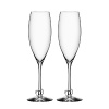A great gift for newlyweds or a romantic anniversary, this set of champagne flutes celebrates being madly in love.