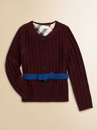 A wide ribbed texture and a contrast ribbon with a bow give this merino wool sweater its pretty panache.Round ribbed necklineLong sleeves with ribbed cuffsContrast attached self beltButton placketWide ribbed hemMerino woolDry cleanImported Please note: Number of buttons may vary depending on size ordered. A wide ribbed texture and a contrast ribbon with a bow give this merino wool sweater its pretty panache.Round ribbed necklineLong sleeves with ribbed cuffsContrast attached self beltButton placketWide ribbed hemMerino woolDry cleanImported Please note: Number of buttons may vary depending on size ordered.