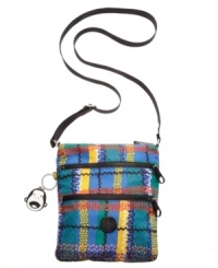 This slim crossbody bag is crafted with multiple compartments to keep your daily must-haves neatly organized and easy to reach. This slim crossbody bag is crafted with multiple compartments to keep your daily must-haves neatly organized and easy to reach.