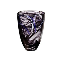 A stunning vase in breathtaking black features thin threads of glass that are hand-applied for a dazzling effect, making a perfect display item in your home. A stunning vase in breathtaking black features thin threads of glass that are hand-applied for a dazzling effect, making a perfect display item in your home.