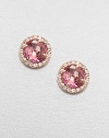Faceted round pink topaz stones surrounded by dazzling white sapphires set in 14k rose gold. Pink topazWhite sapphire14k rose goldSize, about .3 Post backMade in USA