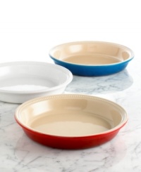Say good pie! Le Creuset's signature French taste shines in this gently sloped dish, which makes it easy to prep & present perfectly sliced pieces of pie. The charming stoneware construction conducts heat like a true natural, crisping edges & crust to the perfect golden brown, and effortlessly moves from oven to table. 5-year warranty. Say good pie! Le Creuset's signature French taste shines in this gently sloped dish, which makes it easy to prep & present perfectly sliced pieces of pie. The charming stoneware construction conducts heat like a true natural, crisping edges & crust to the perfect golden brown, and effortlessly moves from oven to table. 5-year warranty.