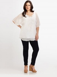 Woven to perfection, this design offers a flawless fit and classic feminine charm in the form of lovely, heart-shaped lace.Gorgeous lace details at necklineFlutter sleevesPull-on styleAbout 33 from shoulder to hemRayonMachine washImported Woven to perfection, this design offers a flawless fit and classic feminine charm in the form of lovely, heart-shaped lace.Gorgeous lace details at necklineFlutter sleevesPull-on styleAbout 33 from shoulder to hemRayonMachine washImported