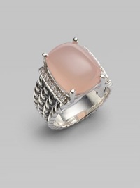 From the Wheaton Collection. A faceted cushion of milky pink opal, edged by rows of diamonds, in a wide cable band of sterling silver.Diamonds, 0.16 tcw Pink opal Sterling silver Width, about ½ Imported From the Wheaton Collection. A faceted cushion of milky pink opal, edged by rows of diamonds, in a wide cable band of sterling silver.Diamonds, 0.16 tcw Pink opal Sterling silver Width, about ½ Imported