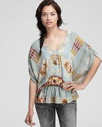 A tribal print in modern hues and breezy silhouette make this Aqua blouse a weekend essential. Pair with your favorite denim and add bohemian accessories for on-trend style. A tribal print in modern hues and breezy silhouette make this Aqua blouse a weekend essential. Pair with your favorite denim and add bohemian accessories for on-trend style.