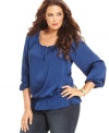 Looking chic is a cinch with MICHAEL Michael Kors' long sleeve plus size top, accentuated by a smocked waist.