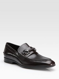 Smooth, sleek design with signature ornament detail.Leather upperPadded insoleRubber soleImported Smooth, sleek design with signature ornament detail.Leather upperPadded insoleRubber soleImported