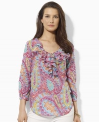 A beautifully bright paisley pattern lends breezy charm to Lauren by Ralph Lauren's top, designed in light-as-air cotton voile with puffed sleeves and voluminous ruffles for a graceful touch. A beautifully bright paisley pattern lends breezy charm to Lauren by Ralph Lauren's top, designed in light-as-air cotton voile with puffed sleeves and voluminous ruffles for a graceful touch.