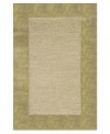 A looped center of mottled tones is framed by rich color in tufted pile, presenting a modern area rug that is both casual and practical. Hand tufted in India of pure wool fibers, the Madrid area rug is a comforting, stylish addition to any decor.