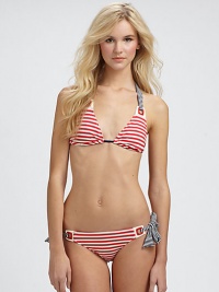 A striped delight with grommet details that connect the unique halter strap ties to triangle cups.Halter strap ties at neckRemovable soft cupsBack tie closure82% nylon/18% spandexFully linedHand washImported Please note: Bikini bottom sold separately. A striped delight with grommet details that connect the unique halter strap ties to triangle cups.Halter strap ties at neckRemovable soft cupsBack tie closure82% nylon/18% spandexFully linedHand washImported Please note: Bikini bottom sold separately.