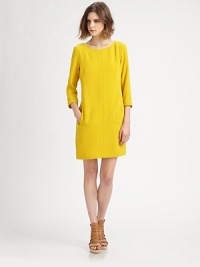An ultra-mod sheath of matte stretch crepe, finished with a flat front and straight A-line fit.ScoopneckThree-quarter sleevesSlash pocketsBodice dartsCenter back zipperAbout 19 from natural waist69% triacetate/31% polyethyleneDry cleanMade in USA of imported fabricModel shown is 5'10 (177cm) wearing US size 4. An ultra-mod sheath of matte stretch crepe, finished with a flat front and straight A-line fit.ScoopneckThree-quarter sleevesSlash pocketsBodice dartsCenter back zipperAbout 19 from natural waist69% triacetate/31% polyethyleneDry cleanMade in USA of imported fabricModel shown is 5'10 (177cm) wearing US size 4.
