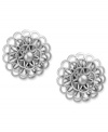 Floral framework. These fresh earrings by Jones New York lend a lovely look with a detailed floral design. Crafted in worn silver tone mixed metal. Clip-on backing for non-pierced ears. Approximate diameter: 1-1/4 inches.