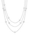 Inch upon inch of brilliant sparkle. Eliot Danori's elegantly-layered necklace highlights bezel-set cubic zirconias (2-3/4 ct. t.w.) strung from delicate chains. Crafted from silver tone mixed metal. Approximate length: 54 inches.
