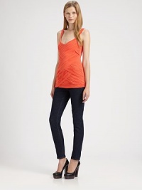 Party-ready bandage top with asymmetrical bands and lots of stretch. V-neckWide straps94% rayon/6% spandexDry cleanMade in USAModel shown is 5'10 (177cm) wearing US size Small. Party-ready bandage top with asymmetrical bands and lots of stretch. V-neckWide straps94% rayon/6% spandexDry cleanMade in USAModel shown is 5'10 (177cm) wearing US size Small.