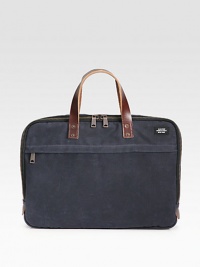 A stylish twill messenger bag for your every file and gadget.Zip-around closureTop handlesAdjustable shoulder strapExterior zip pocketInterior laptop compartment with double snap closureInterior zip pocketInterior organizing pockets16W X 11¾H X 2DCottonImported
